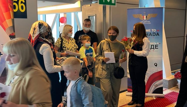 Hurghada International Airport staff received Russian tourists with flowers and chocolates