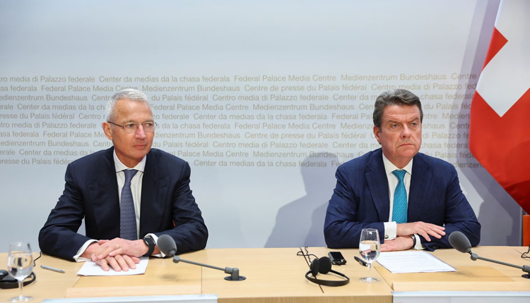 Chairman of the Board of Directors of UBS, Colm Kelleher and Chairman of the Board of Directors of Credit Suisse, Axel Lehmann attend a news conference on Credit Suisse after UBS takeover offer, in Bern, Switzerland, March 19, 2023.