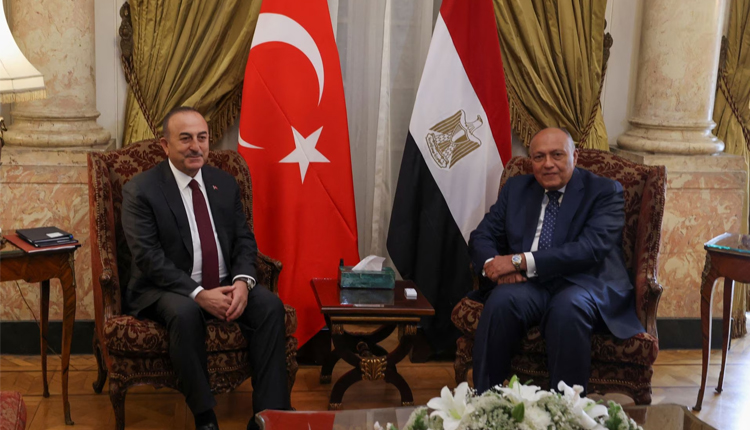 Turkish Foreign Minister Mevlut Cavusoglu meets with his Egyptian counterpart Sameh Shoukry in Cairo, Egypt March 18, 2023