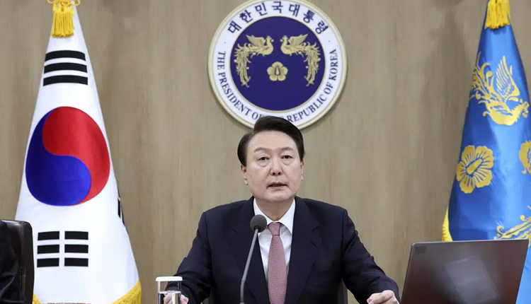 South Korean President Yoon Suk Yeol speak during a cabinet meeting at the president's office in Seoul, March 21, 2023.