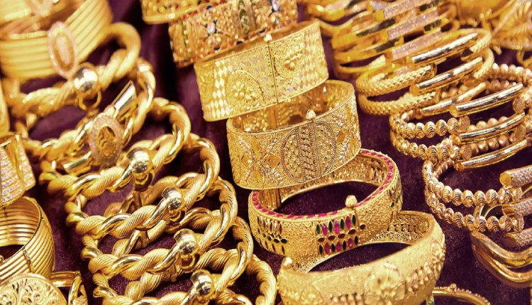 Gold cuffs on display